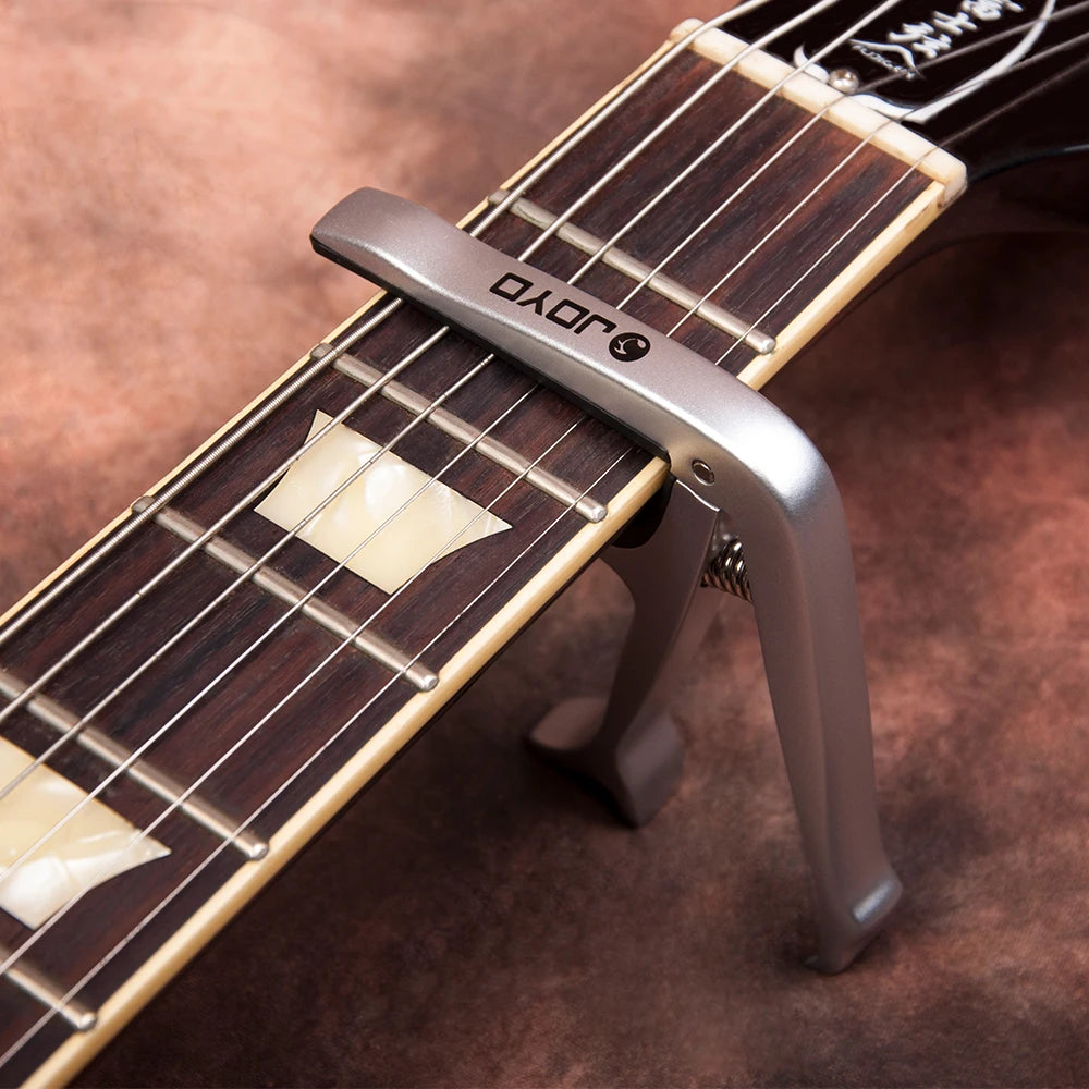 JOYO JCP-02 Adjustable Guitar Capo — Lightweight, Fits Acoustic, Electric & Bass